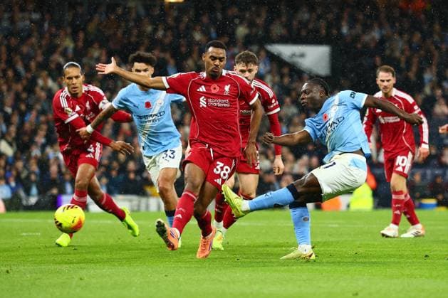 Jeremy Doku of Manchester City shoots at goal Manchester City v Liverpool, Premier League, Football, Etihad Stadium, Manchester, UK - 09 Nov 2025Manchester Etihad Stadium United Kingdom EDITORIAL USE ONLY No use with unauthorised audio, video, data, fixture lists, club league logos or live services. Online in-match use limited to 120 images, no video emulation. No use in betting, games or single club league player publications.  Copyright: xPaulxCurrie Shutterstockx 15702266ex