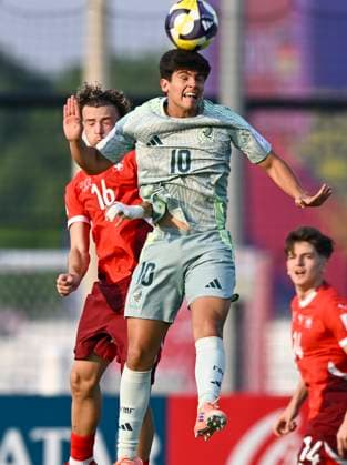 Switzerland v Mexico: Group F - FIFA U-17 World Cup Qatar 2025 Correia Marco of Switzerland and Maximo Reyes of Mexico in action during the FIFA U-17 World Cup Qatar 2025 Group F match between Switzerland and Mexico in Doha, Qatar, on November 10, 2025. DOHA Qatar Copyright: xNOUSHADxTHEKKAYILx