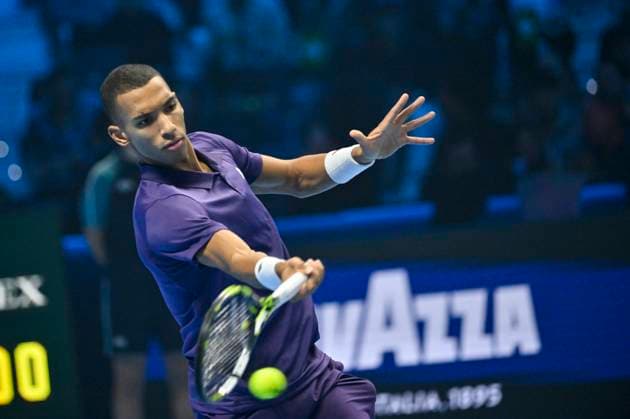 10th November 2025; Palasport Olimpico Arena, Turin, Italy; Nitto ATP, Tennis Herren Finals Tennis 2025; Felix Auger-Aliassime of Canada plays a backhand against Jannik Sinner of Italy  BestxImages