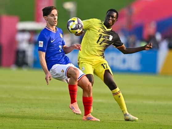 France v Uganda : Group K - FIFA U-17 World Cup Qatar 2025 Isyak Mohamed of France and Arafat Nkoola of Uganda in action during the FIFA U-17 World Cup Qatar 2025 Group K match between France v Uganda in Doha, Qatar, on November 11, 2025. DOHA Qatar Copyright: xNOUSHADxTHEKKAYILx