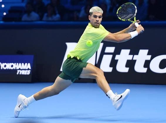 November 11, 2025, Turin, Italy: Carlos Alcaraz of Spain in action during the men s singles Round Robin match against Taylor Fritz of USA at the ATP, Tennis Herren Finals in Turin, Italy, 11 November 2025. ANSA . ATP Finals Tennis Tournament  - ZUMAa110 20251111_zaf_a110_005 Copyright: xAlessandroxDixMarcox