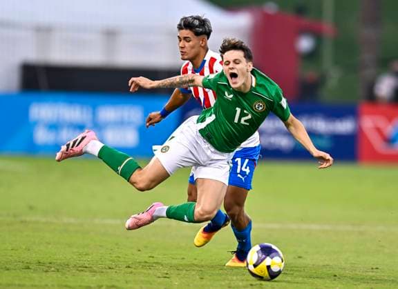 Republic of Ireland v Paraguay: Group J - FIFA U-17 World Cup Qatar 2025 Ryan Butler of Republic of Ireland and Jhosias Campss of Paraguay in action during the FIFA U-17 World Cup Qatar 2025 Group J match between Republic of Ireland v Paraguay in Doha, Qatar, on November 11, 2025. DOHA Qatar Copyright: xNOUSHADxTHEKKAYILx