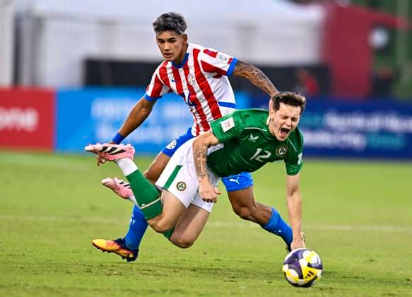 Republic of Ireland v Paraguay: Group J - FIFA U-17 World Cup Qatar 2025 Ryan Butler (R) of Republic of Ireland and Jhosias Campss of Paraguay in action during the FIFA U-17 World Cup Qatar 2025 Group J match between Republic of Ireland v Paraguay in Doha, Qatar, on November 11, 2025. DOHA Qatar Copyright: xNOUSHADxTHEKKAYILx