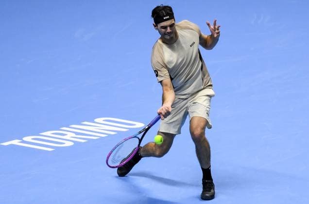 ITALY, TURIN - NOVEMBER 11, 2025: Taylor Fritz of the United States performs in his 2025 ATP, Tennis Herren Finals Jimmy Connors Group round-robin singles tennis match against Carlos Alcaraz of Spain at the Palasport Olimpico 2025 ATP Finals: Carlos Alcaraz 2 - 1 Taylor Fritz  - ZUMAt113 20251111_zaa_t113_355 Copyright: xSergeixVishnevskyx