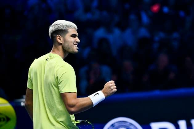 November 11, 2025: Carlos Alcaraz of Spain plays a backhand against Taylor Fritz of the United States during their Men s Single s Nitto ATP, Tennis Herren match during day three of the Nitto ATP Finals at Inalpi Arena on November 11, 2025 in Turin, Italy. - ZUMAg210 20251111_abp_g210_045 Copyright: xStefanoxGuidix
