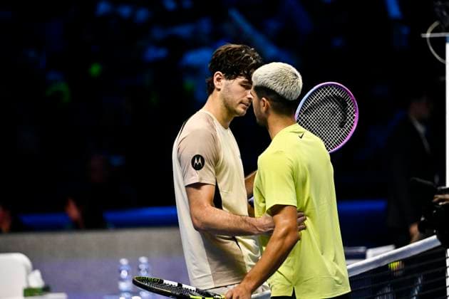 November 11, 2025: Carlos Alcaraz of Spain plays a backhand against Taylor Fritz of the United States during their Men s Single s Nitto ATP, Tennis Herren match during day three of the Nitto ATP Finals at Inalpi Arena on November 11, 2025 in Turin, Italy. - ZUMAg210 20251111_abp_g210_084 Copyright: xStefanoxGuidix