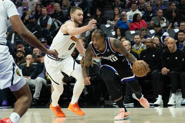 November 11, 2025, Sacramento, Ca, USA: Sacramento Kings guard DeMar DeRozan (10) drives against Denver Nuggets guard Christian Braun (0) during a game at the Golden 1 Center on Tuesday, Nov. 11, 2025, in Sacramento. Sacramento USA - ZUMAj89_ 20251111_zaf_j89_013 Copyright: xPaulxKitagakixJr.x