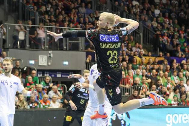 12.11.2025, xtgx, Handball, EHF Champions League, SC Magdeburg - HC Zagreb v.l. Magnus Saugstrup (Magdeburg, 23) wirft Tor, Torschuetze, erzielt Tor, Treffer, scores the goal Magdeubrg