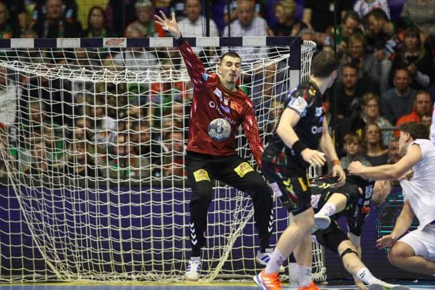 12.11.2025, xtgx, Handball, EHF Champions League, SC Magdeburg - HC Zagreb v.l. Matej Mandic (Magdeburg, 12) Parade, haelt den Ball, faengt den Ball, pariert Magdeubrg
