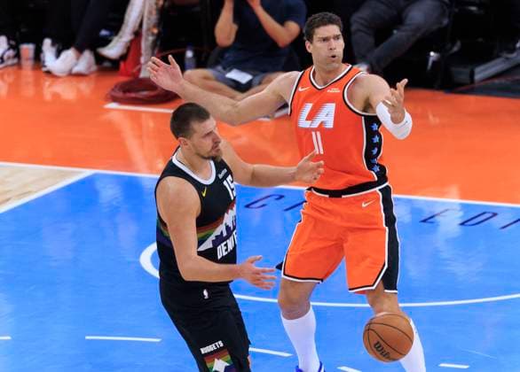 November 12, 2025, Inglewood, California, USA: Brook Lopez 11 of the Los Angeles Clippers contests the foul he committed against Nikola Jokic 15 of the Denver Nuggets during their regular season NBA, Basketball Herren, USA game on Wednesday November 12, 2025 at Intuit Dome in Inglewood, California. Clippers lose to Nuggets, 116-130. ARIANA RUIZ PI Inglewood USA - ZUMAp124 20251112_zaa_p124_046 Copyright: xArianaxRuizx