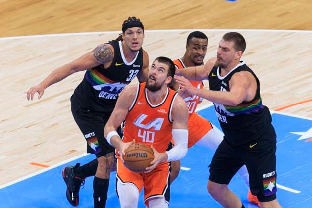 November 12, 2025, Inglewood, California, USA: Ivica Zubac 40 of the Los Angeles Clippers prepares for a two point shot attempt as Aaron Gordon 32 and Nikola Jokic 15 of the Denver Nuggets defend the basket during their regular season NBA, Basketball Herren, USA game on Wednesday November 12, 2025 at Intuit Dome in Inglewood, California. Clippers lose to Nuggets, 116-130. ARIANA RUIZ PI Inglewood USA - ZUMAp124 20251112_zaa_p124_050 Copyright: xArianaxRuizx