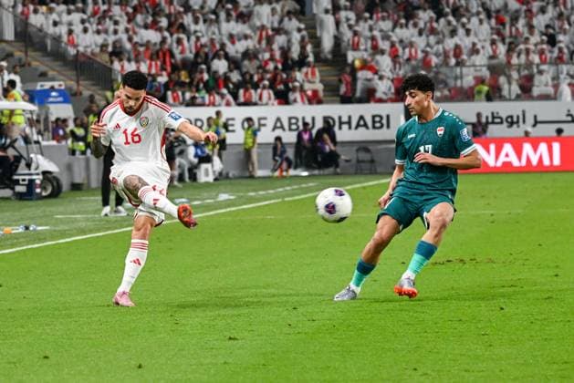 UAE v Iraq - 2026 AFC World Cup Qualifiers ABU DHABI, UNITED ARAB EMIRATES - NOVEMBER 13: Marcus Meloni (L) of UAE in action against Ali Casim (R) of Iraq during the first match of the fifth round of the 2026 FIFA World Cup, WM, Weltmeisterschaft, Fussball Asian Qualifiers at the Mohammed bin Zayed Stadium in Abu Dhabi, United Arab Emirates, on November 13, 2025. Waleed Zein Anadolu Abu Dhabi United Arab Emirates. Editorial use only. Please get in touch for any other usage.  Copyright: x2025xAnadoluxWaleedxZeinx