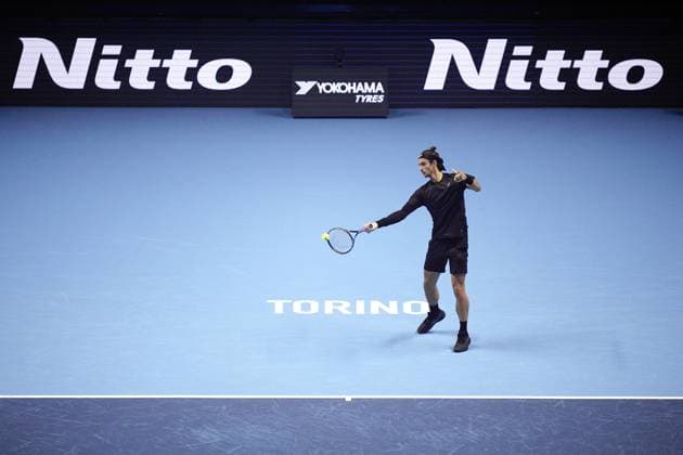Italy s Lorenzo Musetti returns the ball to Carlos Alcaraz during the singles tennis match of the ATP, Tennis Herren World Tour Finals at the Inalpi Arena in Turin, Italy - Thursday, Nov. 13, 2025. -  Copyright: xMarcoxAlpozzi LaPressex