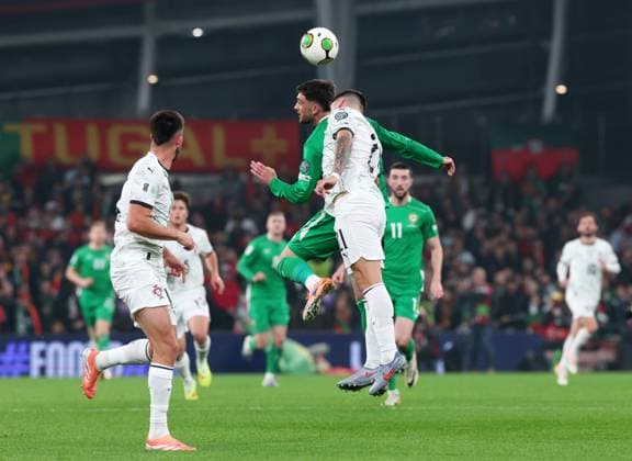 Troy Parrott of the Republic of Ireland and Ruben Neves of Portugal head the ball Republic of Ireland v Portugal, FIFA 2026 World Cup Qualifying, Group F, Football, Aviva Stadium, Dublin, Ireland - 13 Nov 2025Dublin Aviva Stadium Ireland EDITORIAL USE ONLY No use with unauthorised audio, video, data, fixture lists, club league logos or live services. Online in-match use limited to 120 images, no video emulation. No use in betting, games or single club league player publications. Copyright: xLorrainexO Sullivan Shutterstockx 15759346n