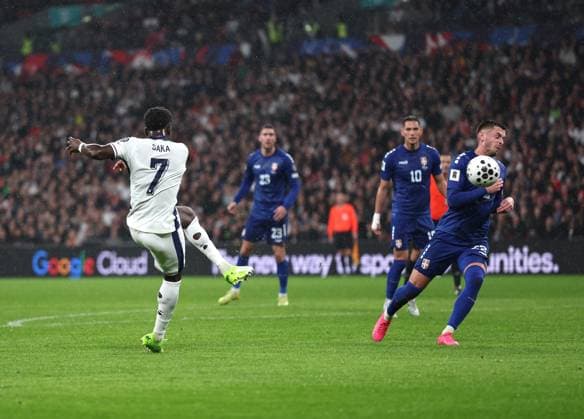 London, England, 13th November 2025. Bukayo Saka of England scoring the first goal on the night during the England vs Serbia FIFA World Cup, WM, Weltmeisterschaft, Fussball European Qualifying match at Wembley Stadium, London. Picture credit should read: David Klein Sportimage EDITORIAL USE ONLY. No use with unauthorised audio, video, data, fixture lists, club league logos or live services. Online in-match use limited to 120 images, no video emulation. No use in betting, games or single club league player publications. SPI_026_DK_Eng_Serbia SPI-4283-0026