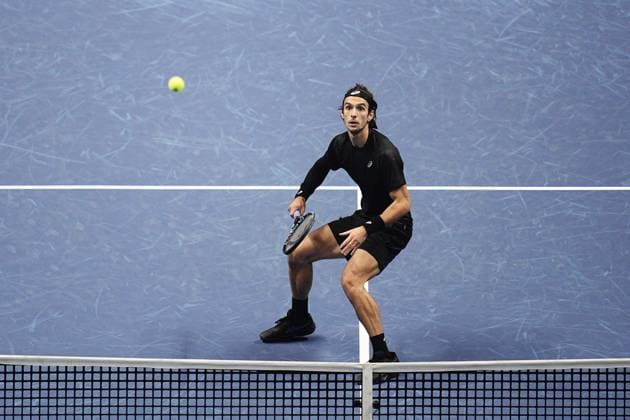Italy s Lorenzo Musetti returns the ball to Carlos Alcaraz during the singles tennis match of the ATP, Tennis Herren World Tour Finals at the Inalpi Arena in Turin, Italy - Thursday, Nov. 13, 2025. -  Copyright: xMarcoxAlpozzi LaPressex