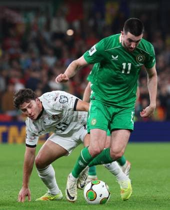 Finn Azaz of the Republic of Ireland is challenged by Joao Neves of Portugal Republic of Ireland v Portugal, FIFA 2026 World Cup Qualifying, Group F, Football, Aviva Stadium, Dublin, Ireland - 13 Nov 2025Dublin Aviva Stadium Ireland EDITORIAL USE ONLY No use with unauthorised audio, video, data, fixture lists, club league logos or live services. Online in-match use limited to 120 images, no video emulation. No use in betting, games or single club league player publications.  Copyright: xLorrainexO Sullivan Shutterstockx 15759346af