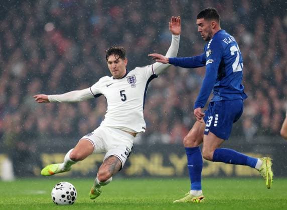 Elliot Anderson of England with Filip Kostic of Serbia England v Serbia - UEFA World Cup Qualifiers - Group K. Football. Wembley Stadium, London. UK. 13 NOV 2025Wembley Wembley Stadium London United Kingdom Editorial use only  Copyright: xJASONPIX Shutterstockx 15785832at