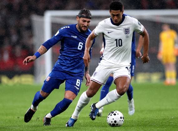 (251114) -- LONDON, Nov. 14, 2025 -- England s Jude Bellingham (R) vies with Serbia s Nemanja Gudelj during the World Cup 2026 European Qualifiers group K football match between England and Serbia in London, Britain, Nov. 13, 2025. ) (SP)BRITAIN-LONDON-FOOTBALL FIFA World Cup, WM, Weltmeisterschaft, Fussball EUROPEAN QUALIFIERS-ENGLAND VS SERBIA LixYing 