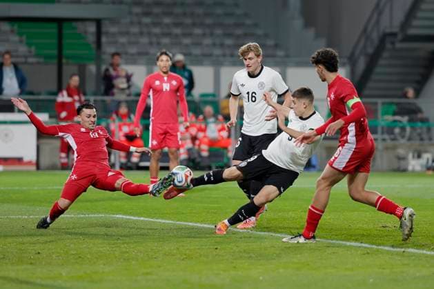From left to right: Benjamin Hill (Malta, 19) and Nicolo Tresoldi (Germany, 9), November 14, 2025, Football, U21, U 21 European Championship, EM, Europameisterschaft Qualification, Deutschland - Malta, GER, Fuerth, Sportpark Ronhof . Copyright: HMBxMedia xHeikoxBecker