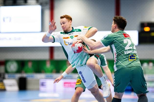 14.11.2025 - Handball, 2025 2026, 1. Bundesliga, 12. Spieltag, GWD Minden - SC DHfK Leipzig: (L-R) Tomas Piroch (Leipzig), Philipp Vorlicek (Minden)