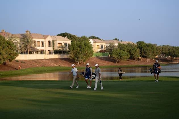 Michael Kim (USA), Tommy Fleetwood (ENG) Round 2 of the DP World Tour Championship 2025, held at the Jumeirah Golf Estate, Earth Course, Dhabi, United Arab Emerites. 13-16 November 2025. Dubai United Arab Emerites DP World Tour, Dp World Tour Championship 2025, Golf x11290x