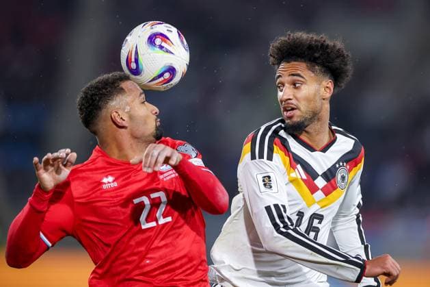 14.11.2025, Fußball, Länderspiel, WM-Qualifikation Europa, Deutschland - Luxemburg, Stade de Luxembourg (Croix de Gasperich, Luxemburg), 9. Spieltag, Saison 2025 2026: Marvin Martins (LUX 22) im Zweikampf gegen Kevin Schade (GER 16) Regulations prohibit any use of photographs as image sequences and or quasi-video. Luxemburg