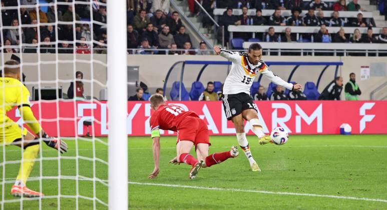 14.11.2025, Fussball, Herren, Qualifikation, European Qualifiers, Luxemburg - Deutschland, Laurent Jans (Luxemburg) Leroy Sane (Deutschland) Luxemburg Stade de Luxembourg Luxemburg Luxemburg (LUX) Copyright: xFabianxKleerx