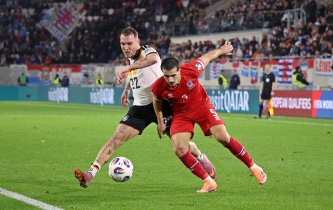 14.11.2025, Fussball, Herren, Qualifikation, European Qualifiers, Luxemburg - Deutschland, David Raum (Deutschland) Alessio Curci (Luxemburg) Luxemburg Stade de Luxembourg Luxemburg Luxemburg (LUX) Copyright: xFabianxKleerx
