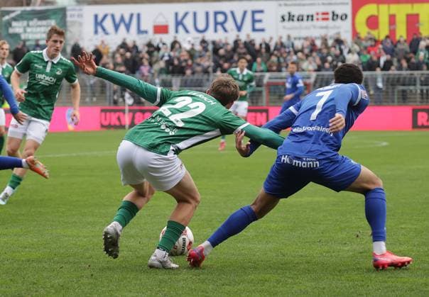 Colin Ulrich (VfB Luebeck), Oliver Schmitt (SV Meppen) Fussball, Herren, Saison 2025 2026, RL-Nord, VfB Luebeck gegen SV Meppen DFL REGULATIONS PROHIBIT ANY USE OF PHOTOGRAPHS AS IMAGE SEQUENCES AND OR QUASI-VIDEO.