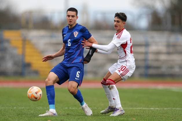 European Championships qualifiers match, Croatia U-19, Gibrltar U-19 Ivan Knezevic of Croatia and Jonathan Rowbottom of Gibraltar in action during round 2 of European Championships 2026 qualifiers match between U19 Croatia and U19 Gibraltar at Branko Cavlovic-Cavlek Stadium on November 15, 2025 in Karlovac, Croatia.  IgorxKralj PIXSELL