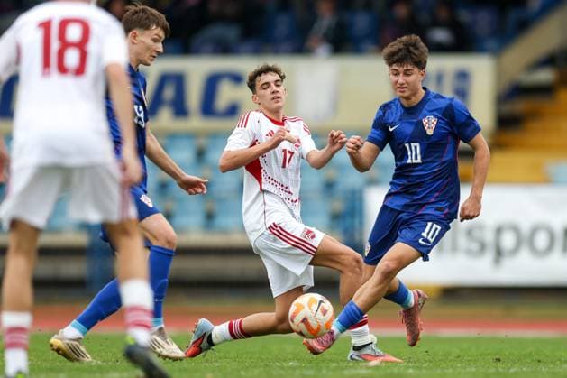 European Championships qualifiers match, Croatia U-19, Gibrltar U-19 Patrice Covic of Croatia and Owen Fortunato compete for a ball during round 2 of European Championships 2026 qualifiers match between U19 Croatia and U19 Gibraltar at Branko Cavlovic-Cavlek Stadium on November 15, 2025 in Karlovac, Croatia.  IgorxKralj PIXSELL