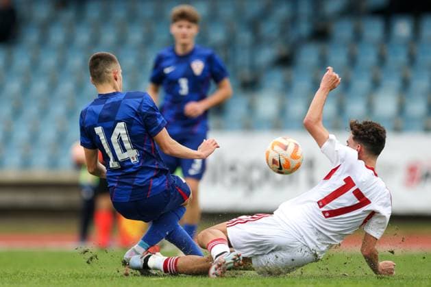European Championships qualifiers match, Croatia U-19, Gibrltar U-19 Matija Subotic of Croatia and Owen Fortunato compete for a ball during round 2 of European Championships 2026 qualifiers match between U19 Croatia and U19 Gibraltar at Branko Cavlovic-Cavlek Stadium on November 15, 2025 in Karlovac, Croatia.  IgorxKralj PIXSELL