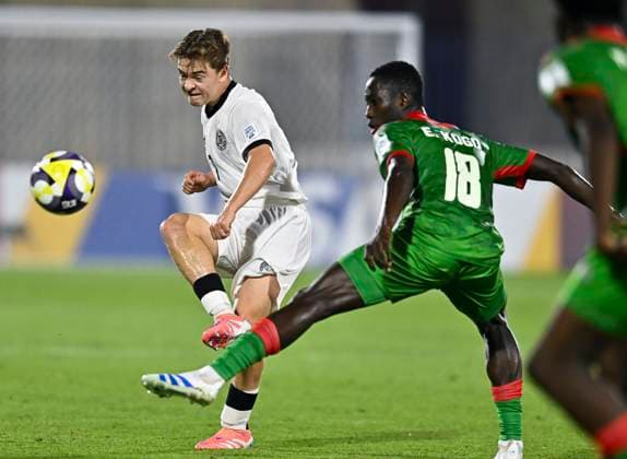 Germany v Burkina Faso: Round of 32- FIFA U-17 World Cup Qatar 2025 Benjamin Ley of Germany and Eddie Kogo of Burkina Faso in action during the FIFA U-17 World Cup Qatar 2025 Round of 32 match between Germany and Burkina Faso in Doha, Qatar, on November 15, 2025. DOHA Qatar Copyright: xNOUSHADxTHEKKAYILx