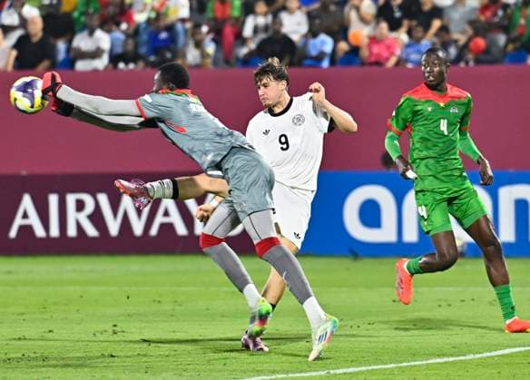 Germany v Burkina Faso: Round of 32- FIFA U-17 World Cup Qatar 2025 Alexander Staff of Germany and Rahim Ouattara of Burkina Faso in action during the FIFA U-17 World Cup Qatar 2025 Round of 32 match between Germany and Burkina Faso in Doha, Qatar, on November 15, 2025. DOHA Qatar Copyright: xNOUSHADxTHEKKAYILx