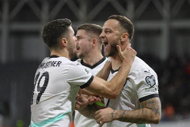 Cyprus Austria WCup Soccer Austria s Marko Arnautovic, right, celebrates with teammates after scoring a penalty, the opening goal of his team, during the World Cup 2026 group H qualifying soccer match between Cyprus and Austria, in Limassol, Cyprus, Saturday, Nov. 15, 2025 Limassol Cyprus  Copyright: xDanilxShamkinx originalFilename:shamkin-notitle251115_np7RN.jpg