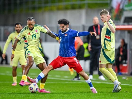 Sorba Thomas (Wales), Ferhat Saglam (Liechtenstein) und Jordan James (Wales) battle for the ball during the FIFA World Cup, WM, Weltmeisterschaft, Fussball 2026 qualifier match between Liechtenstein and Wales at Rheinpark Stadion on November 15, 2025 in Vaduz, Liechtenstein. (Photo by Harry Langer DeFodi Images)