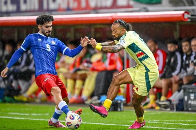 Ferhat Saglam (Liechtenstein) und Sorba Thomas (Wales) battle for the ball during the FIFA World Cup, WM, Weltmeisterschaft, Fussball 2026 qualifier match between Liechtenstein and Wales at Rheinpark Stadion on November 15, 2025 in Vaduz, Liechtenstein. (Photo by Harry Langer DeFodi Images)