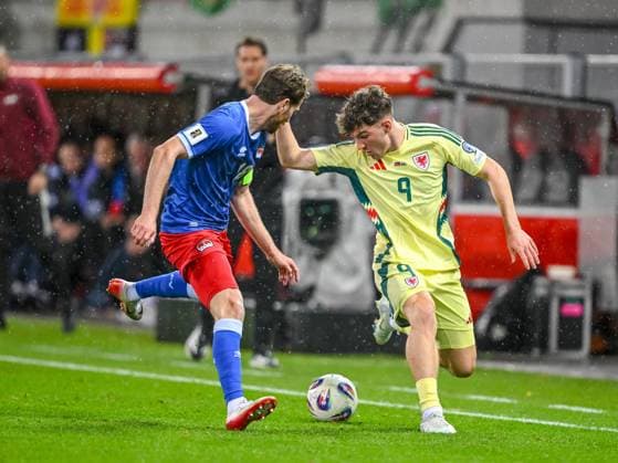 Julien Hasler (Liechtenstein) und Lewis Koumas (Wales) battle for the ball during the FIFA World Cup, WM, Weltmeisterschaft, Fussball 2026 qualifier match between Liechtenstein and Wales at Rheinpark Stadion on November 15, 2025 in Vaduz, Liechtenstein. (Photo by Harry Langer DeFodi Images)