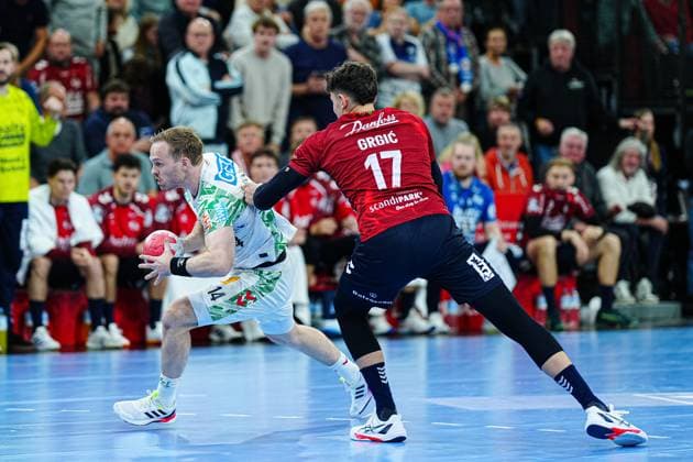 Omar Ingi Magnusson (SC Magdeburg, 14), Marco Grgic (SG Flensburg-Handewitt, 17) GER, SG Flensburg-Handewitt vs. SC Magdeburg, Handball, Bundesliga, Spieltag 12, Saison 2026 2026, 15.11.2025 GER, SG Flensburg-Handewitt vs. SC Magdeburg, Handball, Bundesliga, Spieltag 12, Saison 2026 2026, 15.11.2025 Flensburg Copyright: xEibner-Pressefoto MarcelxvonxFehrnx EP_MFN