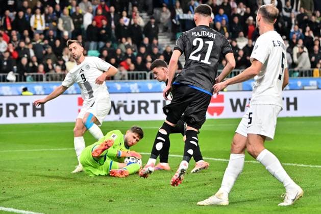 Ljubljana, Slovenia, November 15th 2025, Amir Saipi of Kosovo (2L) in action against Anmdraz Sporar of Slovenia (L) during the UEFA European Qualifiers for 2026 World Cup, Group B match between Slovenia and Kosovo at Stadium Stozice, Ljubljana, Slovenia. (Photo by Igor Kupljenik Sports Press Photo) Copyright: xIgorxKupljenikx xSPPx Sportspressphoto_SPR62156