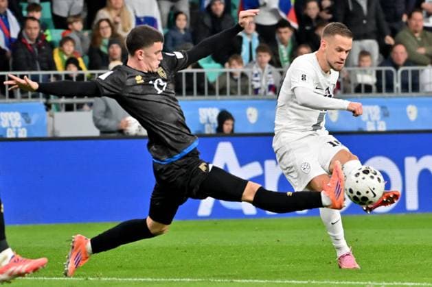 Ljubljana, Slovenia, November 15th 2025, Dion Gallapeni of Kosovo (L) in action against Timi Max Elsnik of Slovenia (R) during the UEFA European Qualifiers for 2026 World Cup, Group B match between Slovenia and Kosovo at Stadium Stozice, Ljubljana, Slovenia. (Photo by Igor Kupljenik Sports Press Photo) Copyright: xIgorxKupljenikx xSPPx Sportspressphoto_SPR62161