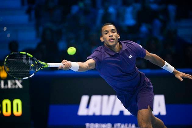 15th November 2025; Palasport Olimpico Arena, Turin, Italy; Nitto ATP, Tennis Herren Finals Tennis 2025; Felix Auger-Aliassime of Canada plays a backhand against Carlos Alcaraz of Spain  BestxImages