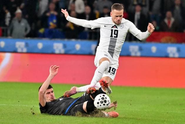 Ljubljana, Slovenia, November 15th 2025, Meriton Korenica of Kosovo (L) in action against Tomi Horvat of Slovenia (R) during the UEFA European Qualifiers for 2026 World Cup, Group B match between Slovenia and Kosovo at Stadium Stozice, Ljubljana, Slovenia. (Photo by Igor Kupljenik Sports Press Photo) Copyright: xIgorxKupljenikx xSPPx Sportspressphoto_SPR62179