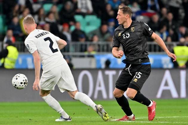 Ljubljana, Slovenia, November 15th 2025, FMergim Vojvoda of Kosovo (R) in action against Zan Karnicnik of Slovenia (L) during the UEFA European Qualifiers for 2026 World Cup, Group B match between Slovenia and Kosovo at Stadium Stozice, Ljubljana, Slovenia. (Photo by Igor Kupljenik Sports Press Photo) Copyright: xIgorxKupljenikx xSPPx Sportspressphoto_SPR62181