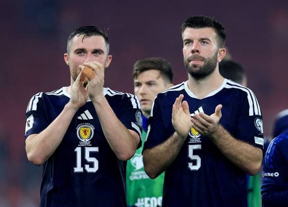 John Souttar of Scotland (left) and Grant Hanley of Scotland shows dejection after their side s defeat Greece v Scotland, FIFA 2026 World Cup Qualifying, Group C, Football, Georgios Karaiskakis Stadium, Athens, Greece - 15 Nov 2025Athens Georgios Karaiskakis Stadium Greece EDITORIAL USE ONLY No use with unauthorised audio, video, data, fixture lists, club league logos or live services. Online in-match use limited to 120 images, no video emulation. No use in betting, games or single club league player publications. Copyright: xGeorgexTewkesbury Shutterstockx 15786154dr