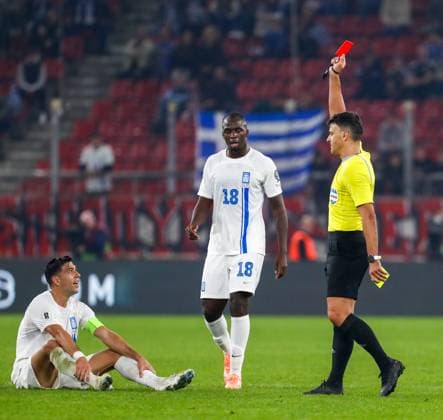 Greece v Scotland 2026 FIFA World Cup, WM, Weltmeisterschaft, Fussball Qualifiers Match referee Jesús Gil Manzano (ESP) show a red card to Tasos Bakasetas of Greece during the 2026 FIFA World Cup Qualifiers Group C match at Karaiskakis Stadium, Piraeus UK Newspapers OUT Copyright: xYannisxHalasx FIL-22494-0069