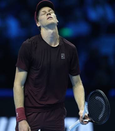 (251116) -- TURIN, Nov. 16, 2025 -- Jannik Sinner reacts after losing a point during the men s singles semifinal match between Jannik Sinner of Italy and Alex De Minaur of Australia at the ATP, Tennis Herren Finals tennis tournament in Turin, Italy, on Nov. 15, 2025. ) (SP) ITALY-TURIN-ATP FINALS-MEN S SINGLES-SEMIFINAL LixJing 