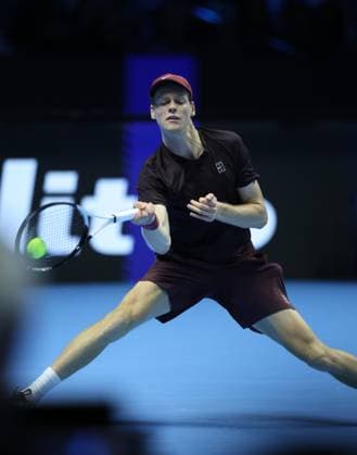 (251116) -- TURIN, Nov. 16, 2025 -- Jannik Sinner returns a shot during the men s singles semifinal match between Jannik Sinner of Italy and Alex De Minaur of Australia at the ATP, Tennis Herren Finals tennis tournament in Turin, Italy, on Nov. 15, 2025. ) (SP) ITALY-TURIN-ATP FINALS-MEN S SINGLES-SEMIFINAL LixJing 