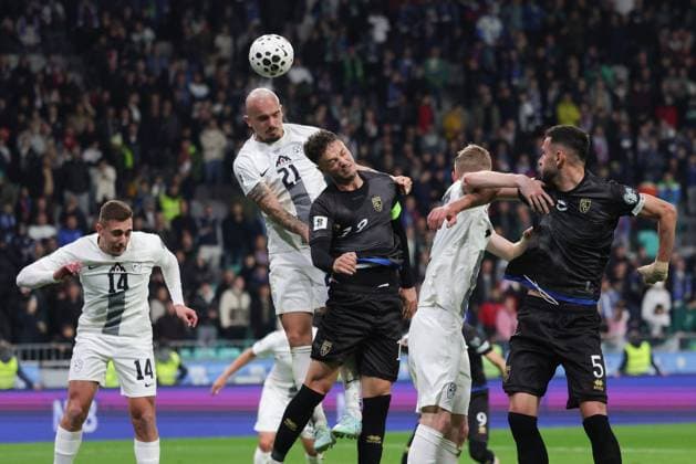 (251116) -- LJUBLJANA, Nov. 16, 2025 -- Vanja Drkusic (2nd L) of Slovenia vies for a header with Amir Rrahmani (3rd L) of Kosovo during the FIFA World Cup, WM, Weltmeisterschaft, Fussball 2026 European qualifiers between Slovenia and Kosovo in Ljubljana, Slovenia, Nov. 15, 2025. (Photo by Xinhua) (SP) SLOVENIA-LJUBLJANA-FIFA WORLD CUP 2026 EUROPEAN QUALIFIERS-SLOVENIA VS KOSOVO ZeljkoxStevanic 
